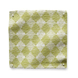 Square fabric swatch in a textural diamond print in lime green and cream.