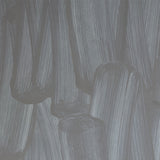 Detail of wallpaper in an abstract paint print in shades of gray.
