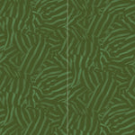 Wallpaper panels in a playful broken stripe print in dark green on a green field.