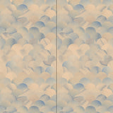 Wallpaper panels in a repeating scalloped print in shades of blue and tan.