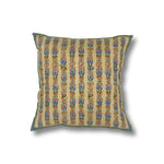 Throw pillow with printed and embroidered floral stripe design in pastel pink, purple and blue and green accents on a white field. 