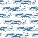 Detail of wallpaper in a running whippet print in navy on a white field.