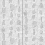 Wallpaper panels in an abstract curvilinear pattern in shades of cream and gray.