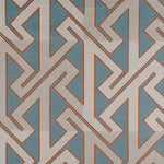 Detail of fabric in a contemporary lattice print in red and gray on a blue field.
