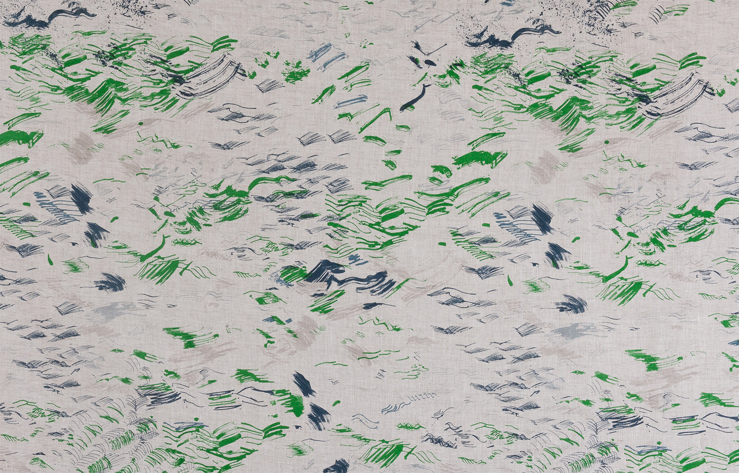 Detail of fabric in a painterly seaside print in gray, blue and green on a greige field.