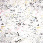 Detail of wallpaper in a painterly seaside print in gray and pastels on a white field.
