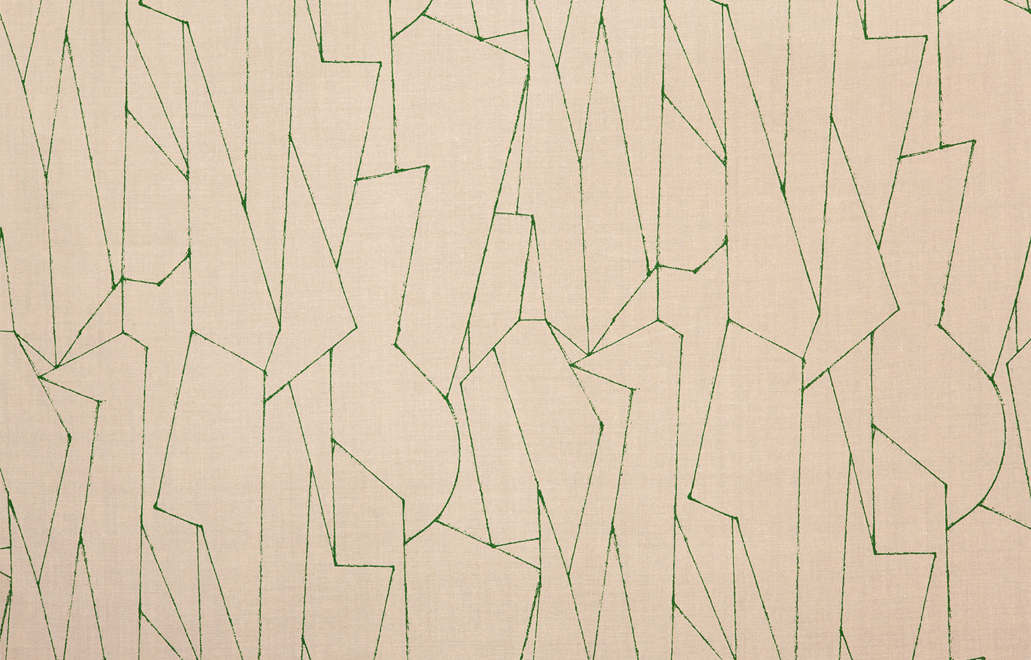 Detail of fabric in an abstract lattice print in green on a tan field.
