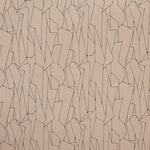 Detail of fabric in a small-scale abstract lattice print in navy on a tan field.