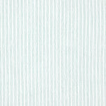 Detail of fabric in a wiggly stripe print in light turquoise on a white field.