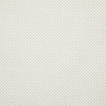 Detail of fabric in a small-scale geometric grid print in white on a cream field.