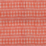 Detail of fabric in a small-scale geometric stripe print in red and white.