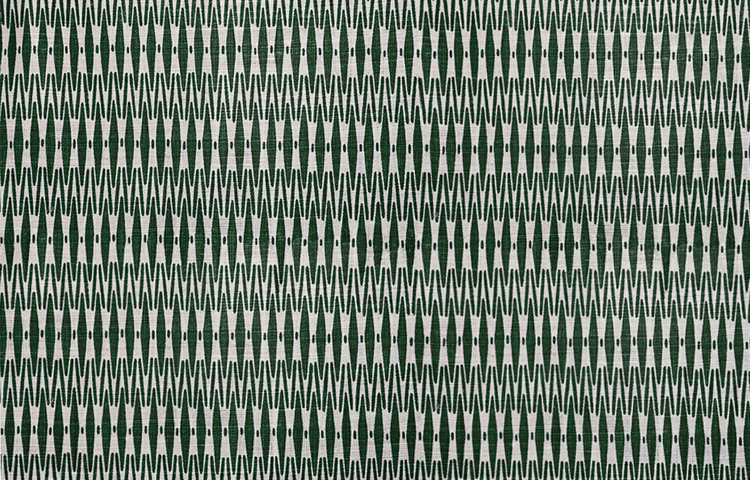 Detail of fabric in a small-scale geometric stripe print in dark green and white.