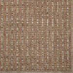 Textured brown and beige woven rug