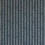 Detail of wallpaper in a repeating striped circular print in cream on a navy field.