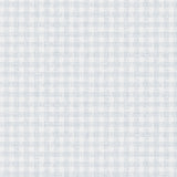 Wallpaper detail in a dense plaid pattern in shades of light blue and cream.