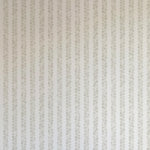 Detail of wallpaper in a repeating striped circular print in gray on a light gray field.