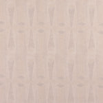 Detail of wallpaper in an abstract geometric print in pink and tan.