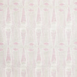 Detail of wallpaper in an abstract geometric print in light pink and green.