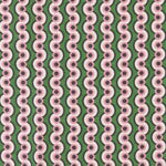 Detail of fabric in a playful curving stripe print in pink, purple and white on a green field.