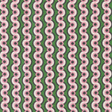 Detail of fabric in a playful curving stripe print in pink, purple and white on a green field.