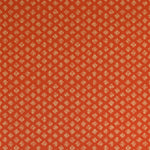 Detail of wallpaper in a minimalist quatrefoil pattern in yellow on a red field.