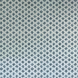 Detail of wallpaper in a minimalist quatrefoil pattern in navy on a light blue field.