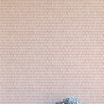 A vase of flowers stands in front of a wall covered in a textural grid print in shades of pink and cream.