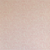 Detail of wallpaper in a textural grid print in shades of pink and cream.