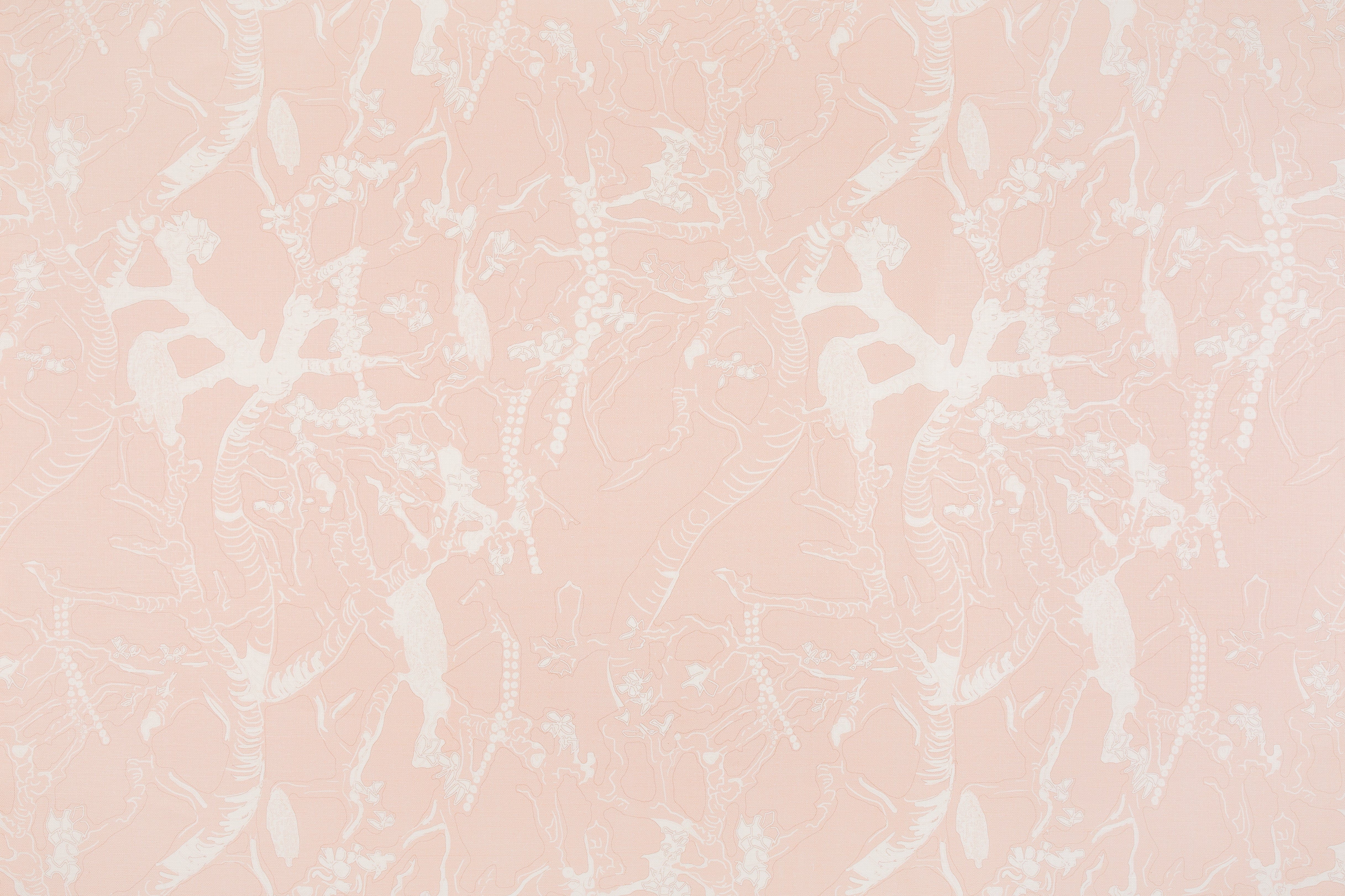Detail of fabric in a branch and blossom print in cream and pink on a pink field.