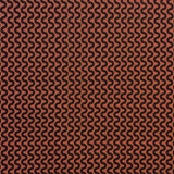 Detail of fabric in a playful curving stripe in black on a burnt orange field.