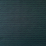 Detail of fabric in a matchstick grid print in navy on a dark green field.