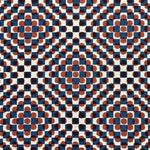 Detail of fabric in a geometric check and polka dot pattern in burnt orange, blue, cream and black.