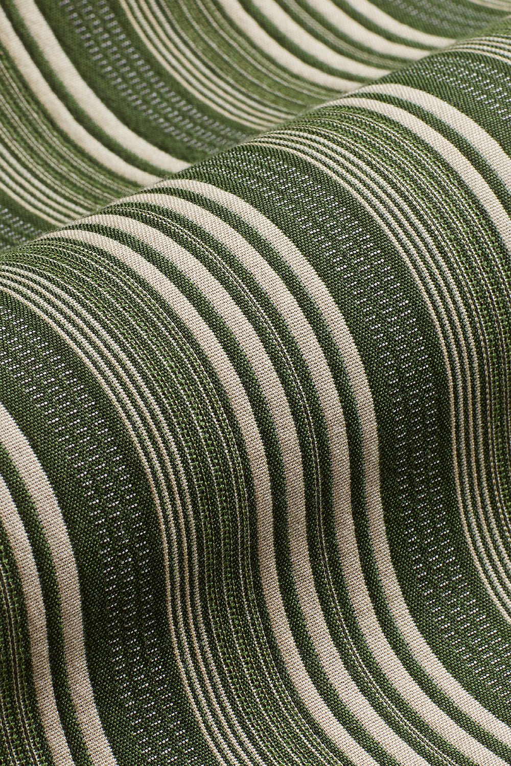 Draped woven fabric in a mixed width stripe design in ivory and forest green.