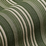 Draped woven fabric in a mixed width stripe design in ivory and forest green.
