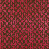 Detail of wallpaper in a repeating botanical grid print in red on a brown field.