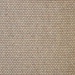 Broadloom carpet swatch in a solid pattern light tan color