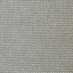 Broadloom carpet swatch in a solid pattern light grey color
