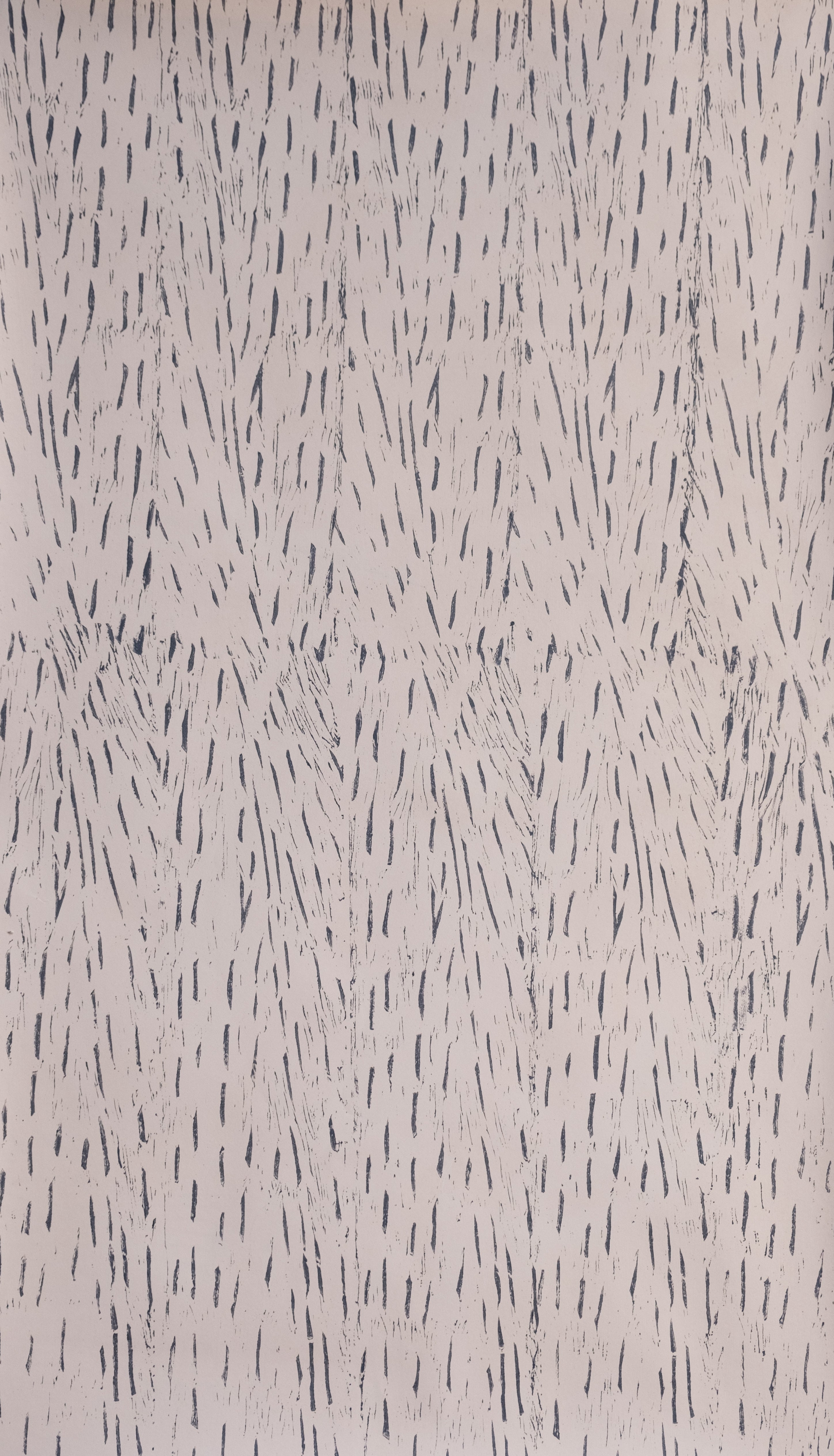 Detail of wallpaper in an abstract textural print in purple on a charcoal field.