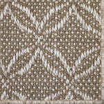 Close-up of a broadloom carpet in a lattice design in taupe.