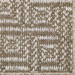 Close-up of a key pattern carpet in ecru.
