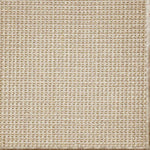 Close-up of a textured woven performance carpet in cream.