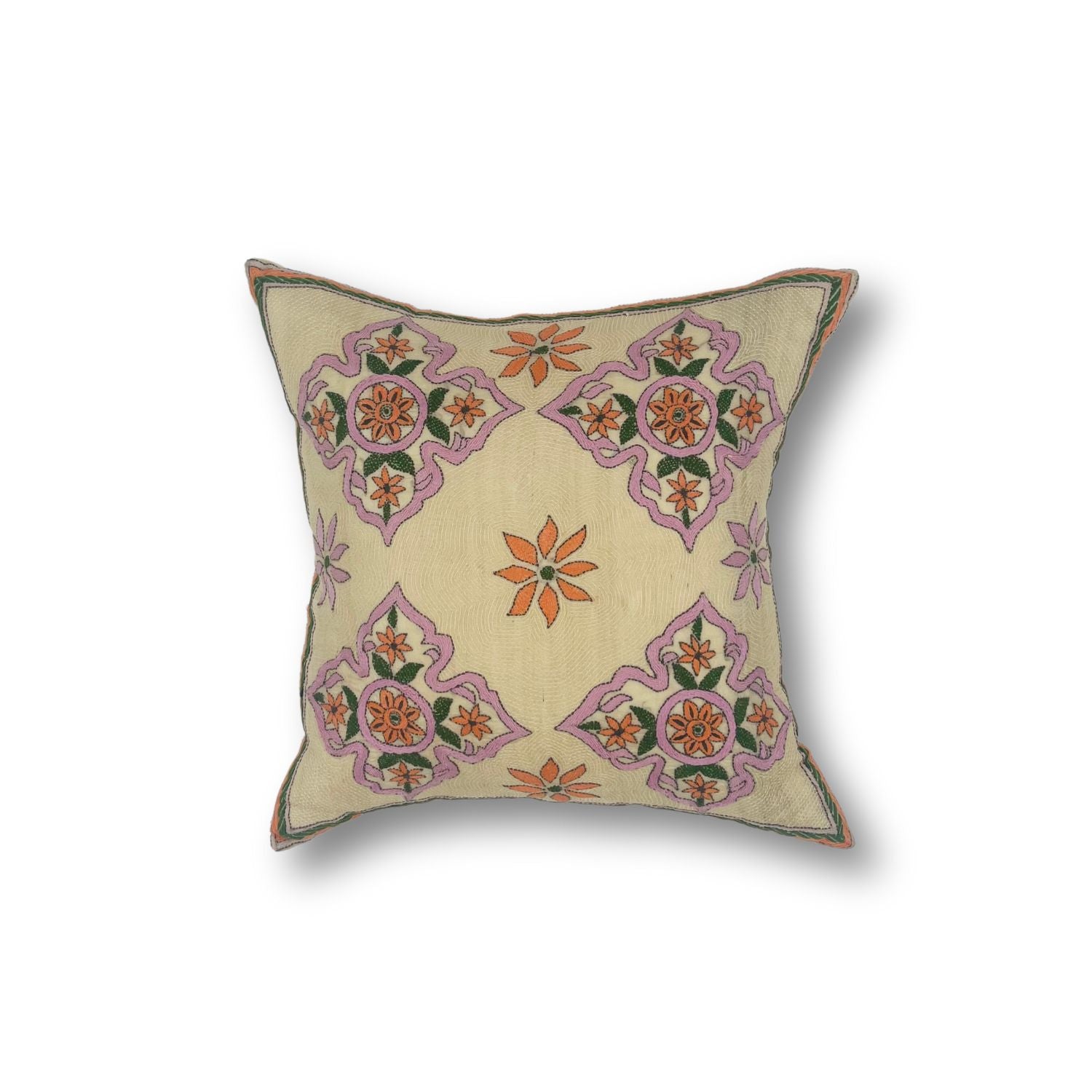 Throw pillow with printed and embroidered design in a floral medallion in pink orange and green. 