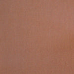 Detail of velvet fabric yardage in apricot.