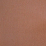 Detail of velvet fabric yardage in apricot.
