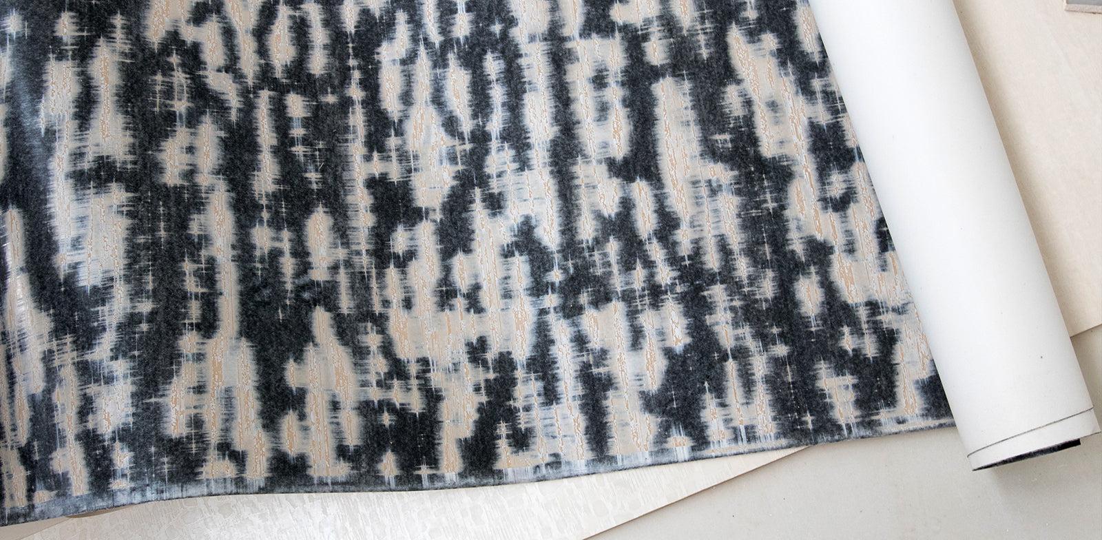 Textured wallpaper with abstract pattern on a light background