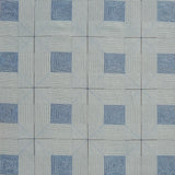 Patterned rug with blue and gray design
