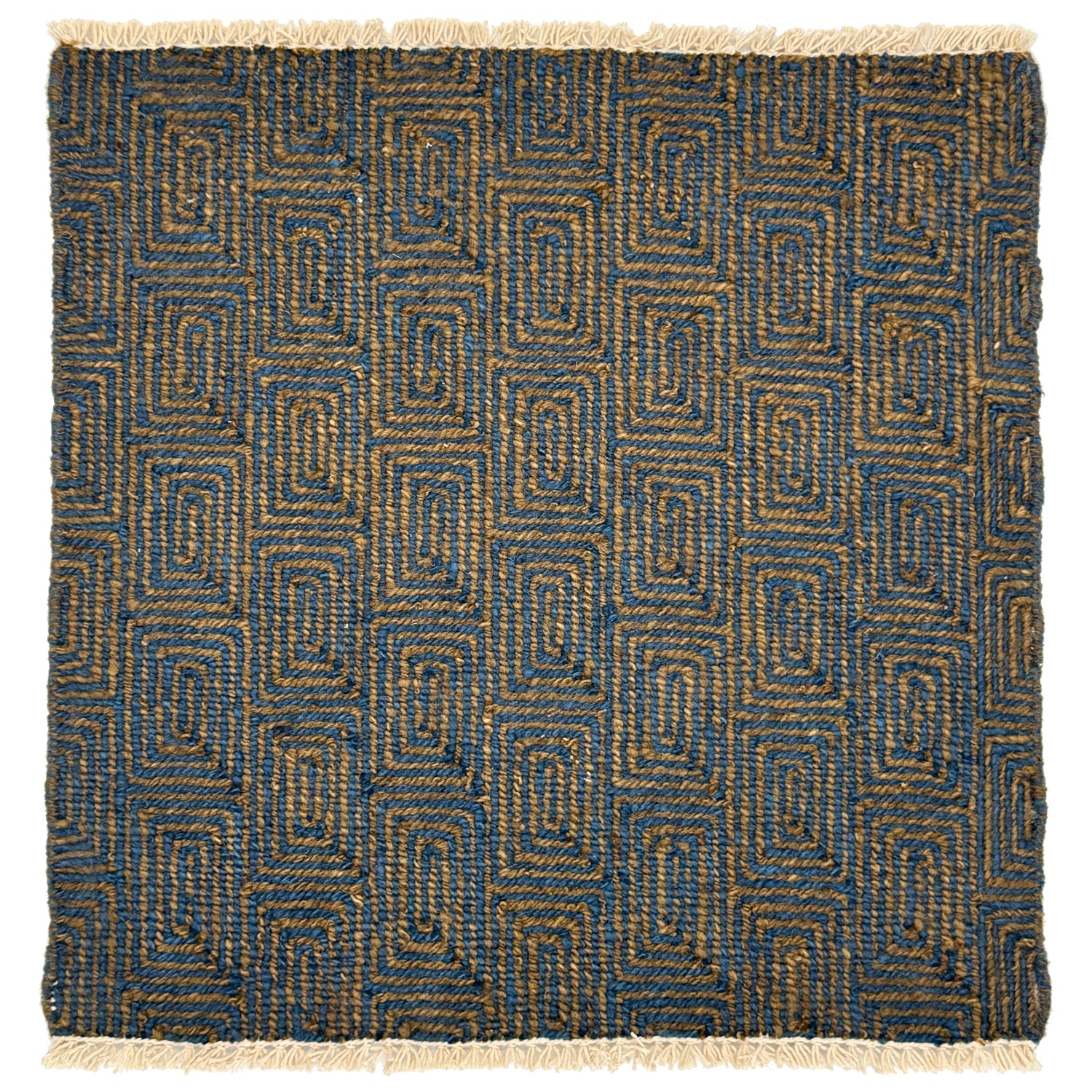A flat weave rug sample with cream-colored fringe at top and bottom and  geometric maze-like pattern in dark blue and tan. 