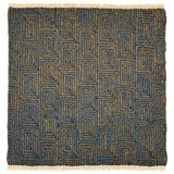A flat weave rug sample with cream-colored fringe at top and bottom and  geometric maze-like pattern in dark blue and tan. 