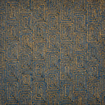A close-up of flatweave rug  with a repeating geometric pattern in dark brown and blue. 