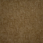 A close-up of flatweave rug  with a repeating geometric pattern in dark brown and grey. 